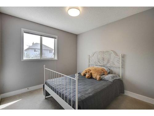 1057 Cranston Drive Se, Calgary, AB - Indoor Photo Showing Bedroom