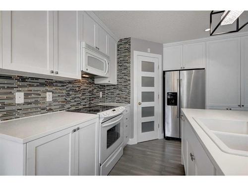 1057 Cranston Drive Se, Calgary, AB - Indoor Photo Showing Kitchen With Upgraded Kitchen