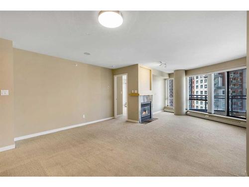1305-1088 6 Avenue Sw, Calgary, AB - Indoor With Fireplace