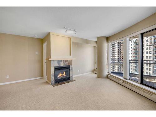 1305-1088 6 Avenue Sw, Calgary, AB - Indoor With Fireplace
