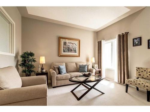 235 Rocky Ridge Drive Nw, Calgary, AB - Indoor Photo Showing Living Room