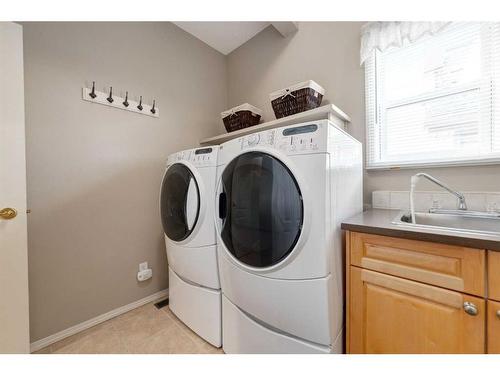 235 Rocky Ridge Drive Nw, Calgary, AB - Indoor Photo Showing Laundry Room