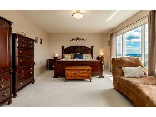 235 Rocky Ridge Drive Nw, Calgary, AB - Indoor Photo Showing Bedroom