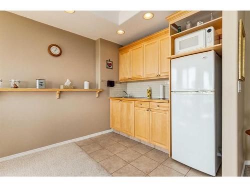 235 Rocky Ridge Drive Nw, Calgary, AB - Indoor Photo Showing Kitchen