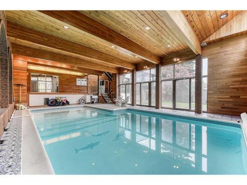 163 Malibou Road Sw, Calgary, AB - Indoor Photo Showing Other Room With In Ground Pool