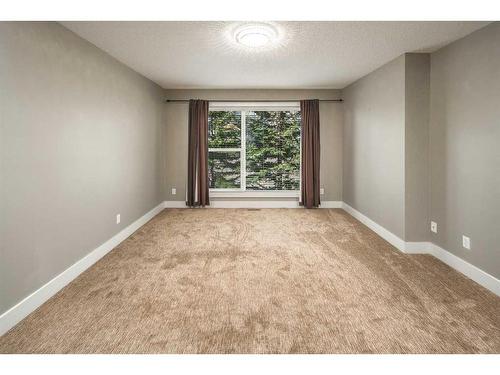 243 St Moritz Drive Sw, Calgary, AB - Indoor Photo Showing Other Room