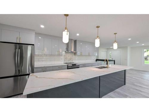 11377 Braeside Drive Sw, Calgary, AB - Indoor Photo Showing Kitchen With Upgraded Kitchen