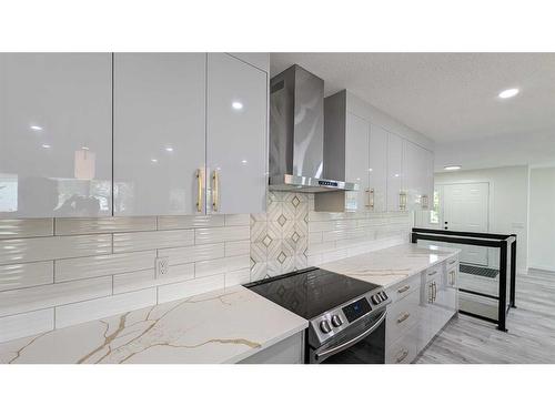 11377 Braeside Drive Sw, Calgary, AB - Indoor Photo Showing Kitchen With Upgraded Kitchen