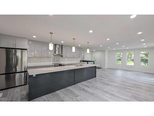 11377 Braeside Drive Sw, Calgary, AB - Indoor Photo Showing Kitchen With Stainless Steel Kitchen With Upgraded Kitchen