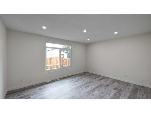 11377 Braeside Drive Sw, Calgary, AB - Indoor Photo Showing Other Room