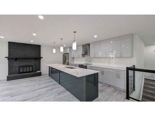 11377 Braeside Drive Sw, Calgary, AB - Indoor Photo Showing Kitchen With Upgraded Kitchen