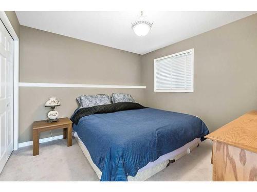 411 Lineham Acres Bay Nw, High River, AB - Indoor Photo Showing Bedroom