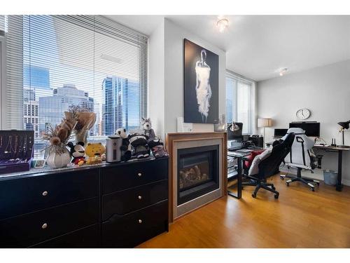 2026-222 Riverfront Avenue Sw, Calgary, AB - Indoor With Fireplace
