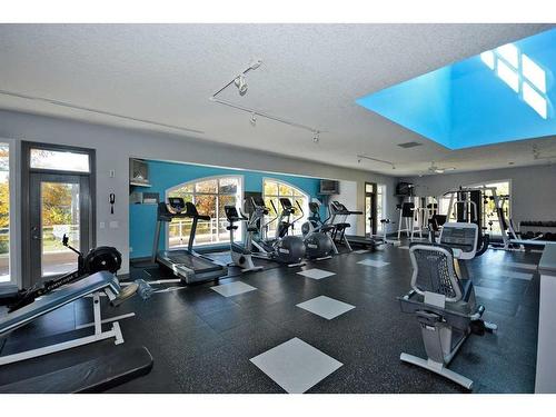 109-2 Hemlock Crescent Sw, Calgary, AB - Indoor Photo Showing Gym Room