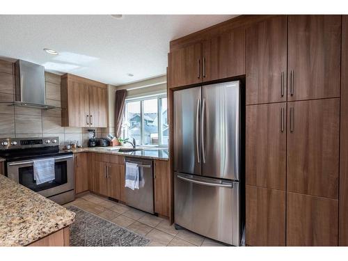 67 Masters Link Se, Calgary, AB - Indoor Photo Showing Kitchen With Stainless Steel Kitchen