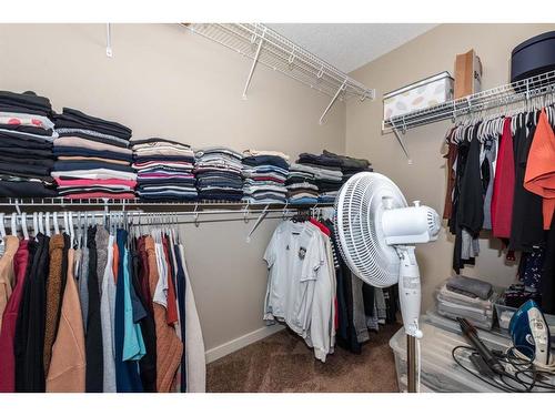 67 Masters Link Se, Calgary, AB - Indoor With Storage
