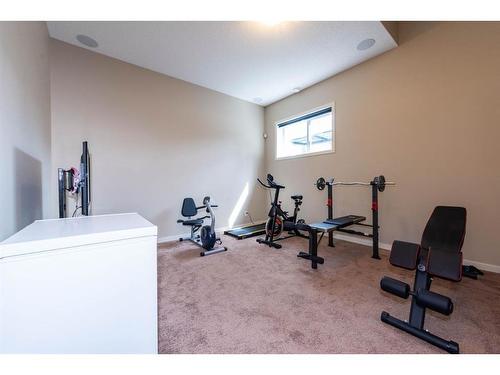 67 Masters Link Se, Calgary, AB - Indoor Photo Showing Gym Room