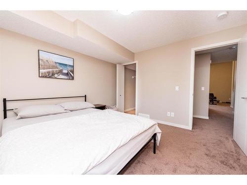 67 Masters Link Se, Calgary, AB - Indoor Photo Showing Bedroom