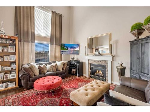 470 Millrise Square Sw, Calgary, AB - Indoor Photo Showing Living Room With Fireplace
