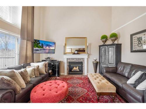 470 Millrise Square Sw, Calgary, AB - Indoor Photo Showing Living Room With Fireplace