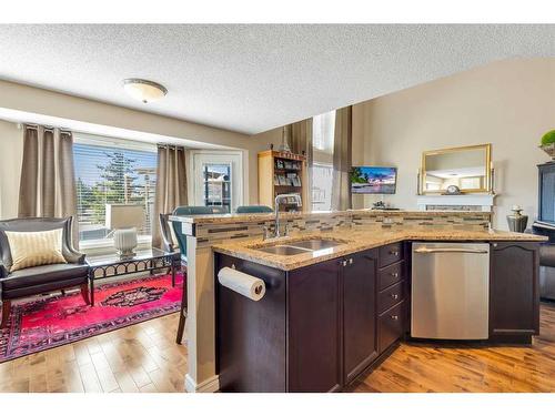 470 Millrise Square Sw, Calgary, AB - Indoor Photo Showing Kitchen With Double Sink