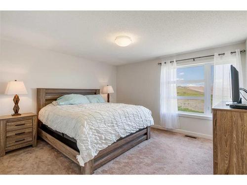 32 Walden Green Se, Calgary, AB - Indoor Photo Showing Bedroom