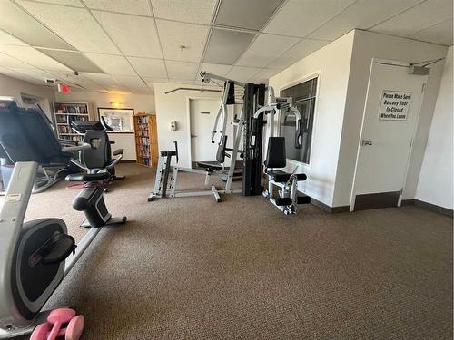 #2307-950 Arbour Lake Road Nw, Calgary, AB - Indoor Photo Showing Gym Room