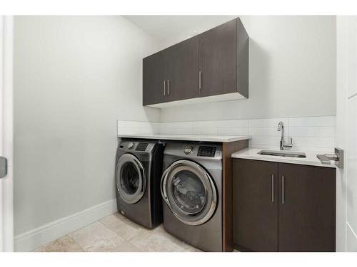 256 Aspen Summit Heath Sw, Calgary, AB - Indoor Photo Showing Laundry Room