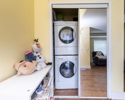 221 Tarawood Close Ne, Calgary, AB - Indoor Photo Showing Laundry Room