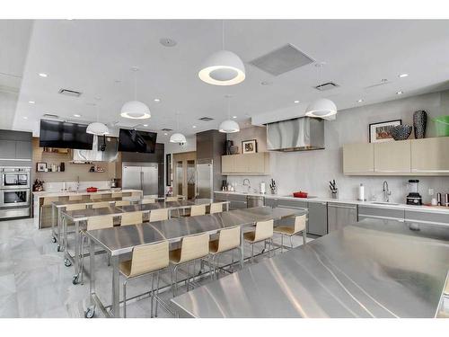 402-11 Mahogany Circle Se, Calgary, AB - Indoor Photo Showing Kitchen With Upgraded Kitchen