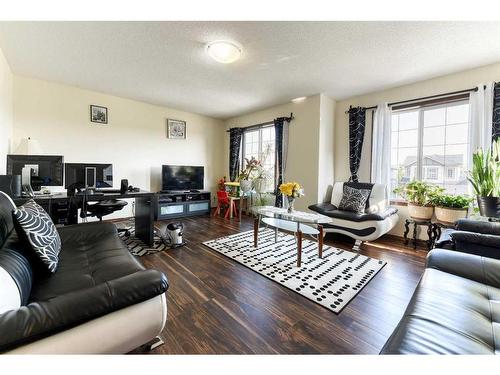 751 New Brighton Drive Se, Calgary, AB - Indoor Photo Showing Living Room