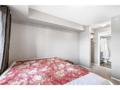 404-15 Saddlestone Way Ne, Calgary, AB - Indoor Photo Showing Bedroom