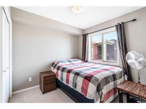404-15 Saddlestone Way Ne, Calgary, AB - Indoor Photo Showing Bedroom