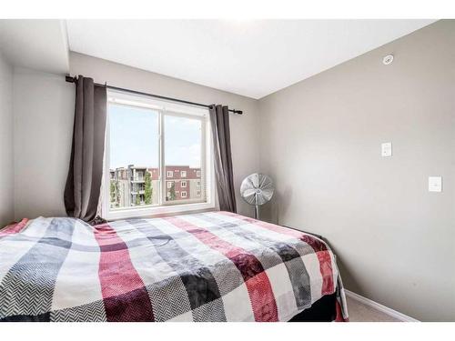 404-15 Saddlestone Way Ne, Calgary, AB - Indoor Photo Showing Bedroom