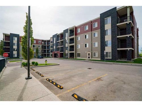 404-15 Saddlestone Way Ne, Calgary, AB - Outdoor With Balcony With Facade