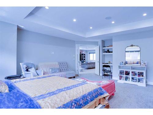 249 Kinniburgh Boulevard, Chestermere, AB - Indoor Photo Showing Bedroom