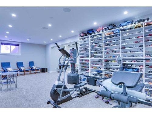 249 Kinniburgh Boulevard, Chestermere, AB - Indoor Photo Showing Gym Room