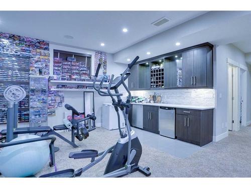 249 Kinniburgh Boulevard, Chestermere, AB - Indoor Photo Showing Gym Room