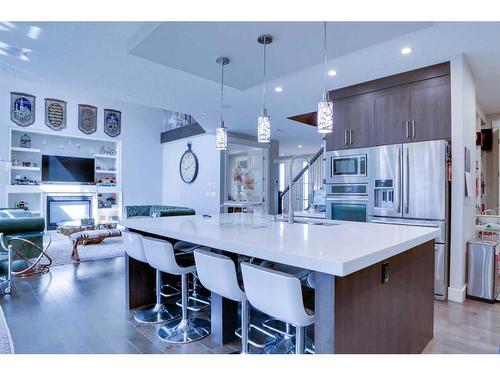 249 Kinniburgh Boulevard, Chestermere, AB - Indoor Photo Showing Kitchen With Stainless Steel Kitchen With Upgraded Kitchen