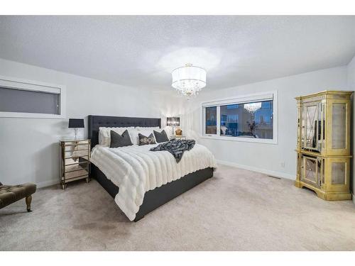 318 Crestmont Drive Sw, Calgary, AB - Indoor Photo Showing Bedroom