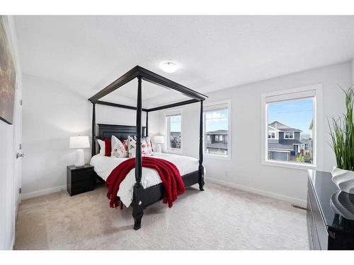 318 Crestmont Drive Sw, Calgary, AB - Indoor Photo Showing Bedroom