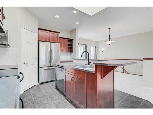 19 Prestwick Heath Se, Calgary, AB - Indoor Photo Showing Kitchen With Double Sink