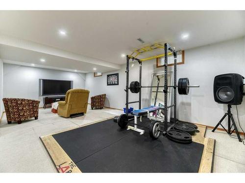 840 Suncastle Road Se, Calgary, AB - Indoor Photo Showing Gym Room