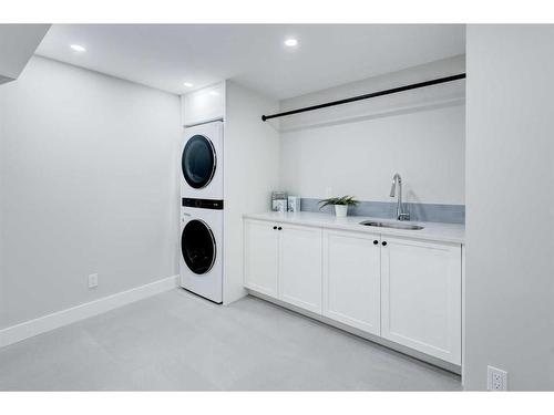 1116 Lake Wapta Place Se, Calgary, AB - Indoor Photo Showing Laundry Room