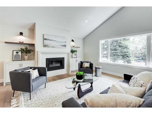 1116 Lake Wapta Place Se, Calgary, AB - Indoor Photo Showing Living Room With Fireplace