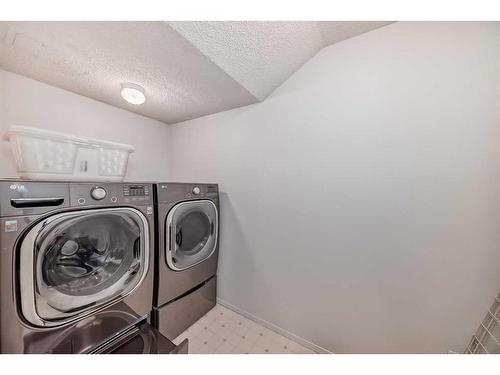 12 Stratton Hill Rise Sw, Calgary, AB - Indoor Photo Showing Laundry Room