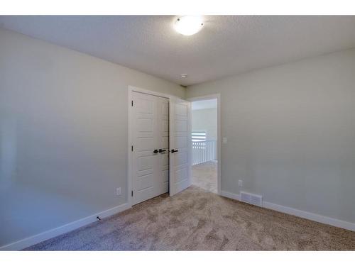 239 Chelsea Heath, Chestermere, AB - Indoor Photo Showing Other Room