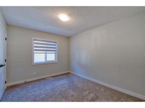 239 Chelsea Heath, Chestermere, AB - Indoor Photo Showing Other Room