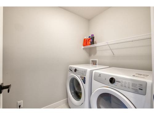239 Chelsea Heath, Chestermere, AB - Indoor Photo Showing Laundry Room