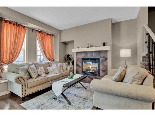 1101-155 Silverado Skies Link Sw, Calgary, AB - Indoor Photo Showing Living Room With Fireplace